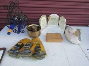 lot 85 image: 2 tier wine bottle holder 2 empty blufeld wine bottles 3 NIB CameraVideo AC adapters misc. brass pieces and more