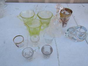 lot 89 image: Crystal glass bell, 5 shot glasses 3 yellow glass creamers and sugars