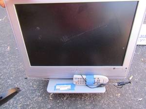 lot 11 image: 18 Sanyo TV with remote and antenna unknown working condition