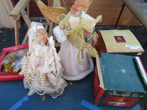 lot 18 image: 2 merry bright christmas angels, Holiday lane snow globe, and classic treasure mice on dresser