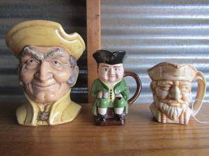 lot 114 image: Three  Toby mugs