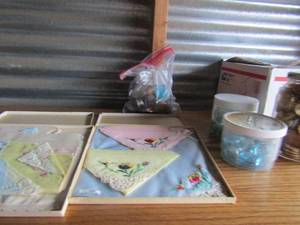 lot 128 image: 2 small sets of Vintage ladies hankies, dcor rocks, bag of tokens, Jar of  Crown caps