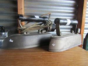 lot 132 image: 2 very heavy American beauty Electric pressing irons