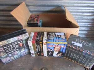 lot 141 image: Box of VHS movies include Harry Potter, Red Skelton, Old time radio set, Suzy Ormon and more