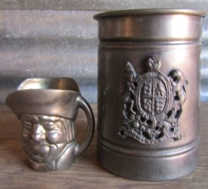 lot 157 image: Metal  handled mug B650   and metal  unmarked Toby mug
