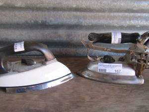 lot 167 image: White corded GE iron and a Reemer 720 volt steam flat iron
