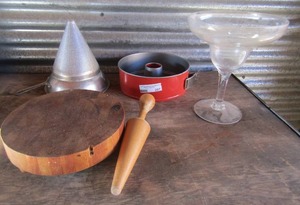 lot 207 image: Oval wood stand, CONE STRAINERCOLANDER WITH WOODEN MALLET,  Red  cake pan with bottom release,  10 martini glass