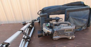 lot 208 image: JVC GY-DV500 news camera with tape recorder Serious 4897 flash and microphone carry case and tripod
