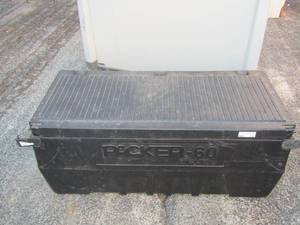 lot 219 image: Black truck bed tool chest 43x19 hard plastic with side latches WITH CONTENTS