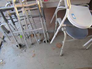 lot 223 image: 2 bedside commodes and 3 fold up walkers