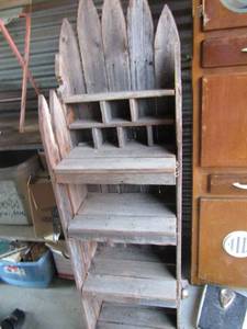 lot 224 image: wooden bookshelf made out of fence posts needs TLC 60x18x12