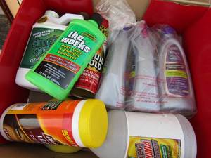 lot 302 image: Bottle of simple green, auto cleaner, the works rust remover, 3 bottles of shark carpet cleaner NEW and 1 bottle of ammonia