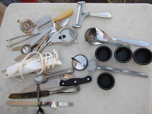 lot 304 image: Kitchen lot- B&D electric knife only 1 blade, Meat tenderizer, 4 salsa bowls, meat thermometer, cheese dicer, spoons, knives, Ice cream scoop