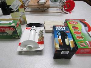 lot 35 image: NIB Pineapple slicer x 2 NIB watermelon and more slicer Gourmet cheese mill NIB and Mr. BBQ