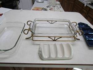 lot 37 image: 2 Pyrex 3qt.baking dishes 1 with gold stand, shell napkin holder, blue glass light hose veggie tray
