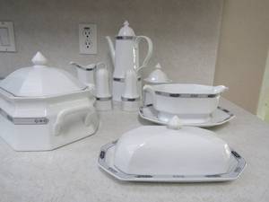 lot 2 image: Christopher Stuart Lyric Fire China- Covered coffeetea pitcher, creamer and sugar, S&P shakers, Gravy boat on saucer, covered butter dish and bread bowl