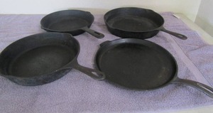 lot 78 image: Wagner ware cast skillet 11   11 cast iron  skillet griddle   Cast iron skillet 10   Cast iron skillet 12