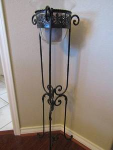 lot 11 image: Metal frame  Candle stand glass insert  mint condition  46x10
