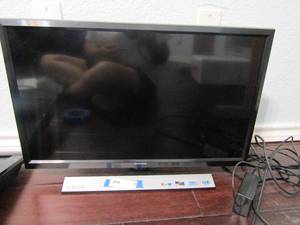 lot 30 image: Samsung LED TV 26 on stand no remote