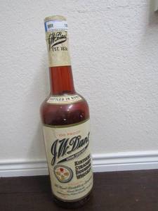 lot 18 image: J.W.  Dant Kentucky Whisky bottle Est.1836 plastic 24