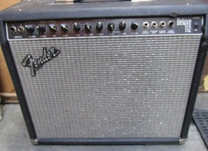 lot 176 image: Fender Deluxe 112 black amplifier with plugs