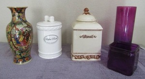 lot 102 image: Garden Ridge 12 vase, Purple 12 and 5 vase, Dog bone container and biscotti covered cannister
