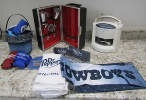 lot 105 image: Winstar Cowboy scarves x 4 koosies, Dr. pepper towels, jar opener and bar set