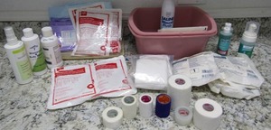 lot 131 image: Wound care items, hot packs, gauze, aloe wash and more
