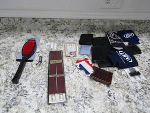 lot 139 image: Mens wallets, lint brush, Santana ties, luggage tags and more