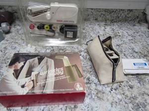 lot 141 image: Osrow Mini Iron SD-03t in Case,   NEW Singer handy stitch and wrinkles away electric  steamer