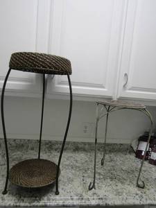 lot 145 image: Plant stand wicker and metal 30x14 Metal outdoor plant stand 21x12
