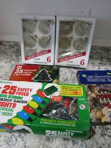 lot 159 image: Nobility box christmas lights, miniature lights 2 boxes of clear bulb diamond lights