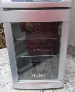 lot 162 image: Haier Wine cooler NEW holds 4 bottles of wine
