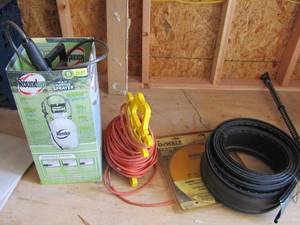 lot 192 image: De Walt 12 80 tooth blade NEW   Orange 20FT. Extension cord  Round up yard pump    black flower bed trim