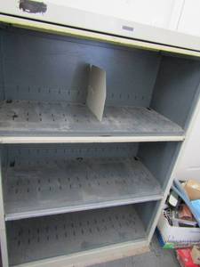 lot 202 image: Metal  3 shelf front pull down door for storage space in garage 52x36x17