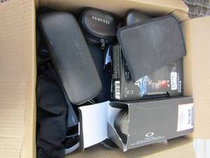 lot 207 image: Box of sunglasses and cases