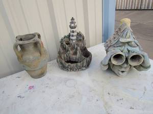 lot 219 image: Pottery lot-bird house, vase amd light house fountain