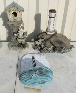 lot 220 image: Tree stump bird house   15 tall lighthouse ,wall plaque ocean view light house on huge rock - all molded plasterresin