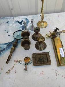 lot 232 image: Brass lot- candle holders, Decor horn, snuffers, magnifying glass