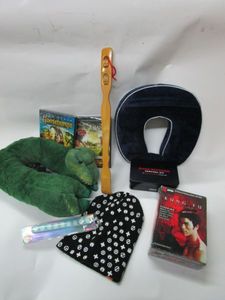 lot 26 image: LOUNGING LOT NECK PILLOWS, BINGE-WATCHING SURVIVAL KIT, KUNG FU COLLECTION DVDs UNOPENED, BEENIE, GOOSEBUMPS & FACING GIANTS DVDs & MORE