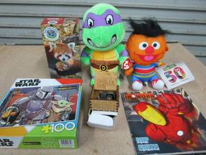 lot 30 image: STAR WARS 100 PC PUZZLE, ANIMAL PUZZLE, BEAUTY & THE BEAST WOODEN MUSIC BOX (WORKING), IRONMAN PICTURE BOOK, PLUSH DONATELLO & ERNIE