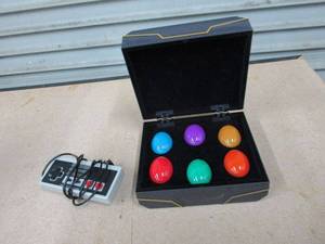 lot 34 image: CONTROLLER FOR ORIGINAL NINTENDO, GREAT CONDITION, MARVEL vs CAPCOM INFINITE GAME PIECE, LIGHTS UP BUT NEEDS BATTERIES