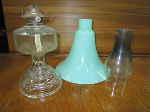 lot 51 image: VINTAGE GLASS OIL LAMP STILL CONTAINING WICK