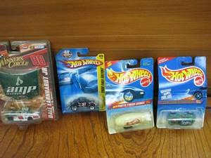 lot 96 image: PACKAGED WINNERS CIRCLE DALE EARNHARDT JR 88 CAR WITH AMP HOOD REPLICA, HOTWHEELS BIFF BAM BOOM SERIES VW BEETLE, HOTWHEELS BLIMP, HOTWHEELS FIRST EDITIONS PASSN GASSER