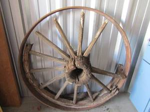 lot 14 image: 42  wagon wheel some pieces are falling apart