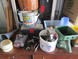 lot 21 image: 2 hand held yard seeders, 1 gallon jug, liquid flex and seal opened, yard sprayer and more