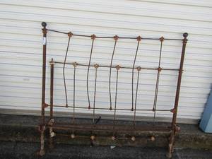 lot 24 image: Antique full size metal headboard and footboard