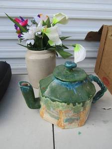 lot 35 image: Braided handle teapot and flower vase both handmade