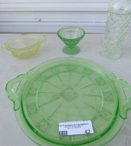 lot 42 image: Uranium glassGreen glass- platter, creamsugar, glass bottle , sugar bowl