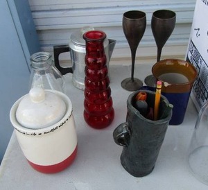 lot 44 image: Glass milk jug, hot chocolate milk jug, red vase, metal coffee pot 2 brass wine glasses